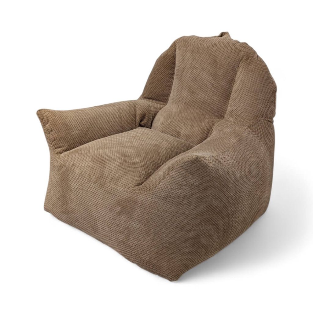 פוף כורסא לסלון VOLENDAM חום בהיר ממוקם בסלון